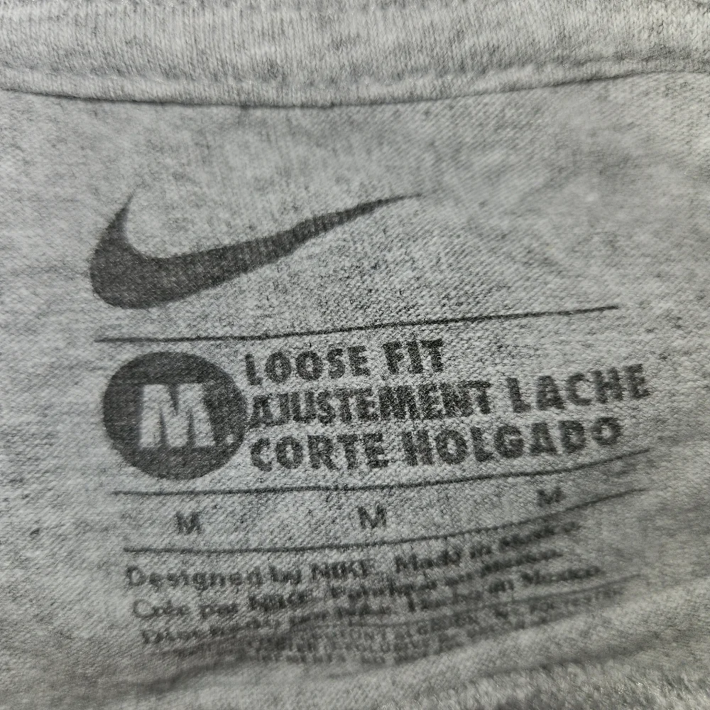 Nike UConn Volleyball “Block Party” Graphic Tee – Gray | Size Medium